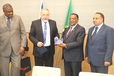 Exchange of gifts between Mr. Avigdor Lieberman, Israeli Defence Minister and Dr Augustine Mahiga, Tanzania Minister for Foreign Affairs. In March 2018, Mr Lieberman visited Tanzania on a three-country trip to Africa, declaring that Africa has a huge potential and Israel as a world leader in advanced technologies has exactly what Africa needs in agriculture, medecine, security, counter-terrorism and border defences.